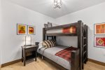 Bedroom three has a twin-over-queen bunk bed system. 